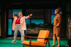 Falstaff (Brian Mani) uses his brazen skills of seduction on a surprised Mrs. Ford (Ami Brabson) on Folger Theatre’s The Merry Wives of Windsor. On stage January 14 – March 1, 2020. Photo by Cameron Whitman Photography.